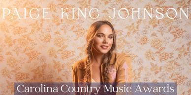 https://www.broadwayworld.com/ezoimgfmt/cloudimages.broadwayworld.com/columnpiccloud/Paige-King-Johnson-Nominated-For-Female-Country-Songwriter-And-Country-Tour-Of-The-Year-At-The-Carolina-Country-Music-Awards-1698679302.jpg?ezimgfmt=rs:388x194/rscb37/ngcb36/notWebP