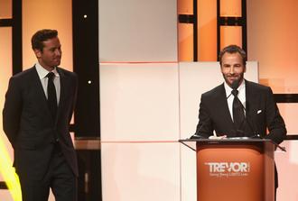 Honoree Tom Ford accepts the Hero Award from Armie Hammer Photo (2017-12-04)